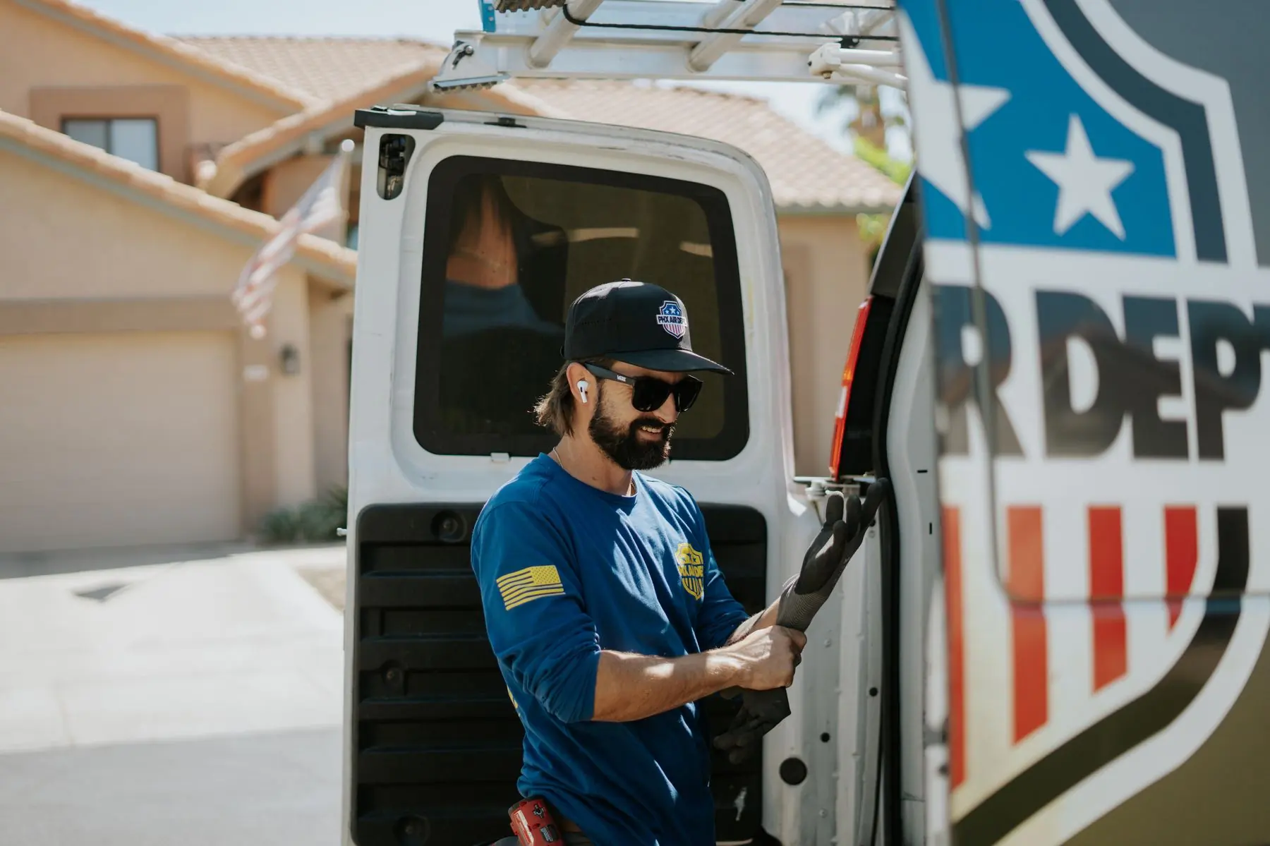 Technician standing by the Phoenix Air Department service van